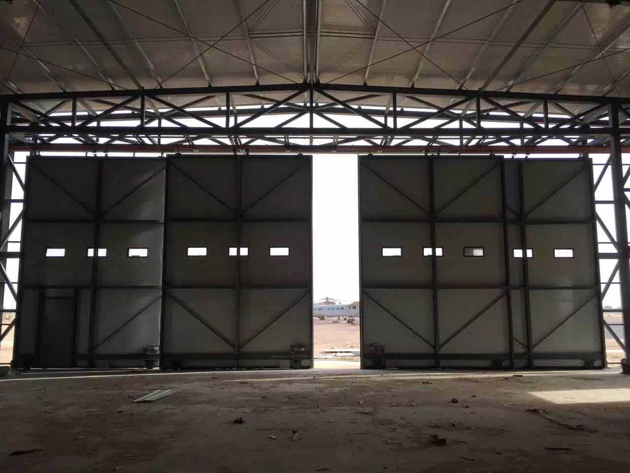 Large Hangar Doors: Niger Military Hangar Doors (Case)