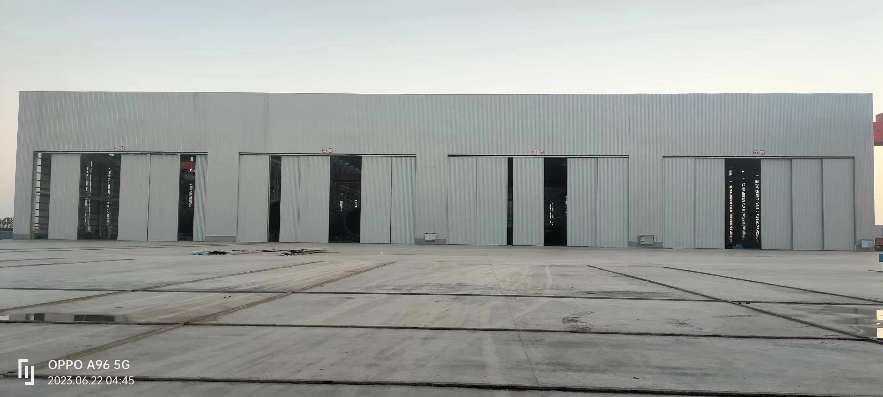 Large Aircraft Hangar Doors: Dongying Port Large Aircraft Hangar Sliding Doors (Case)